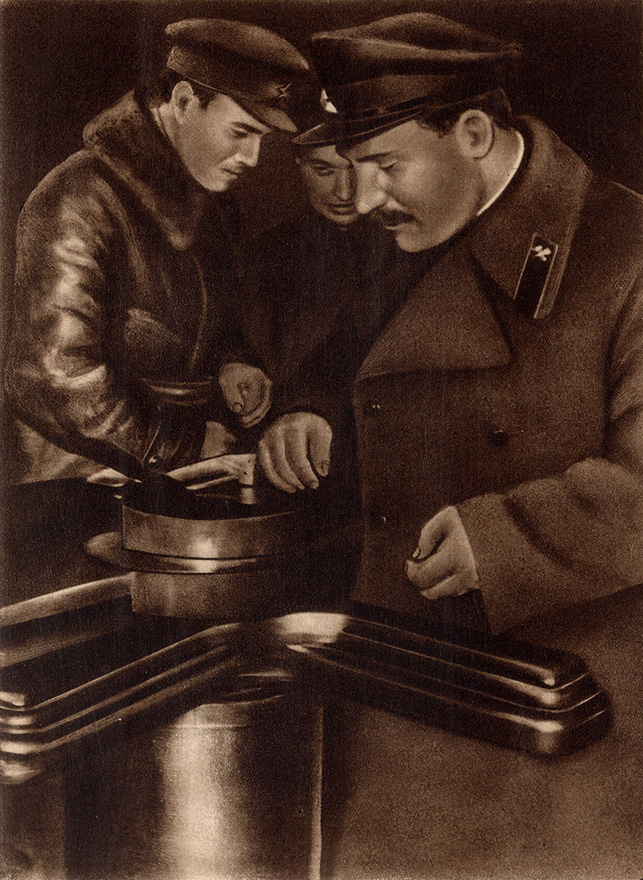 Kaganovich, People's Commissar of Railways, inspecting a turnstile on the Moscow Metro 1935